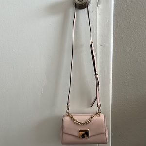 Michael Kors cross body bag . Light pink